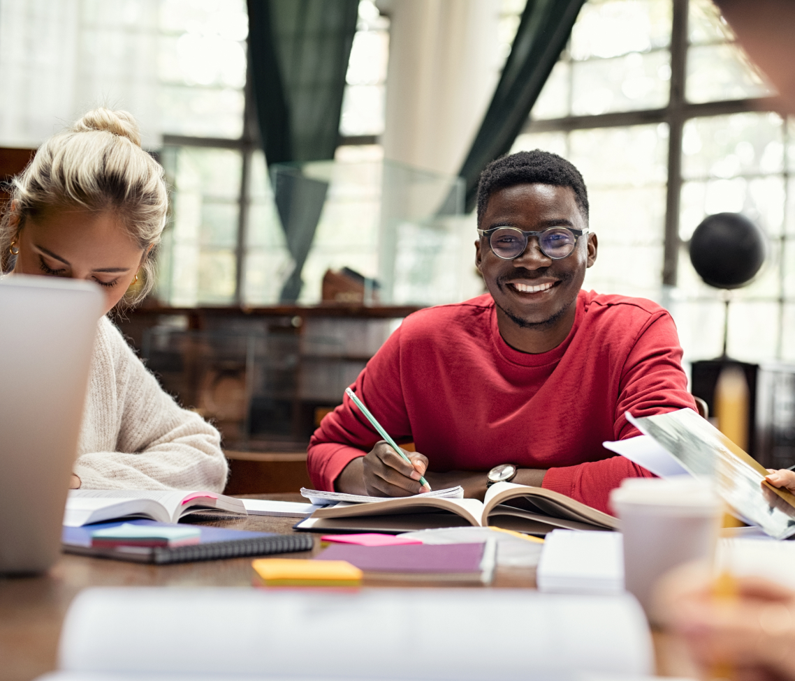 two students studying in a library